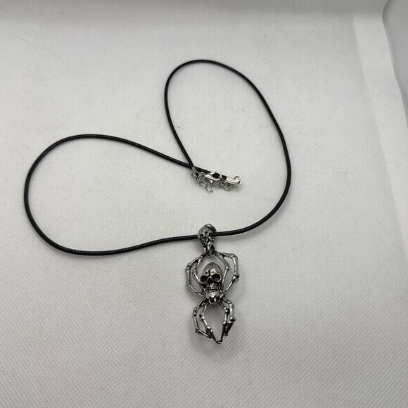 NWOT Skull with spider leg pendant with wax cord - Picture 1 of 4